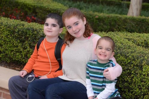Mikey celebrating his 9th birthday in Disney World with sister Katie and brother Timmy.